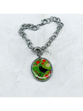 1007mc. Reversible Bird Bracelet Charm